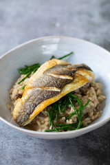 Mushroom risotto with samphire and pan fried sea bass