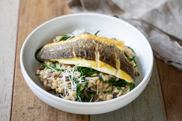 Mushroom risotto with samphire and pan fried sea bass
