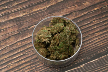 Marijuana cannabis Medicinal, weed joint In a glass container, drugs.