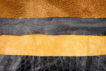 Brown leather and black alligator skin textures background