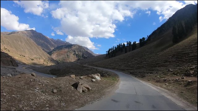 driving in Pakistan Mountains with beautiful landscape having brown color mountains in the month of Autumn
