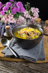 Polish barley soup with vegetables and chicken heart.