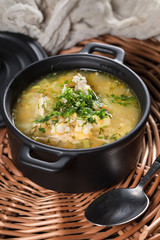 Barley soup with vegetables and chicken.