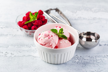 Raspberry ice cream in bowl
