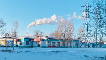 Fototapeta na wymiar Factory at china north region Inner Mongolia, the smog from the pipe