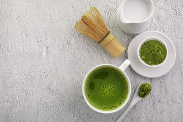 Matcha powder. Organic green matcha tea ceremony. Healthy drink. Traditional japanese drink on white background