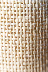 wavy surface weaving natural straw material. texture