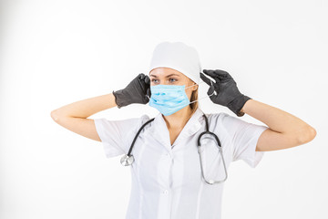 Fototapeta na wymiar Wearing protective mask. Female doctor or nurse in latex or rubber gloves. Health care concept