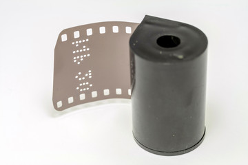 Old camera film on isolated white background.
