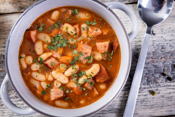 Baked beans in tomato sauce with chopped sausage