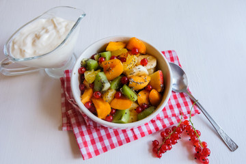 .Diet, healthy fruit salad in a white bowl-healthy Breakfast, weight loss concept.