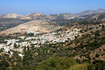 Fototapeta na wymiar Filoti, Naxos / Greece - August 25, 2014: Filoti village view, Naxos, Cyclades Islands, Greece