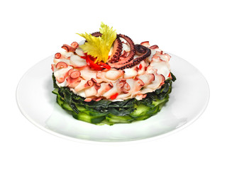 Healthy fresh salad with octopus, seaweed and cucumber