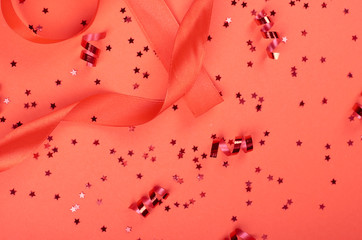 Decorative red ribbon flat lay.