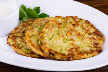 Olady vegetable with greens fried in a pan