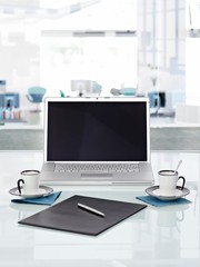 Office desk with laptop