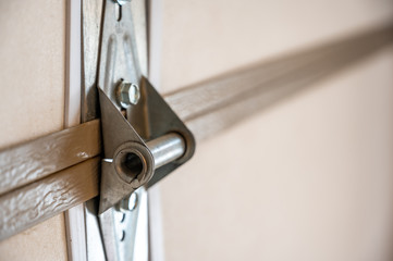 Garage door metal panel hinge 