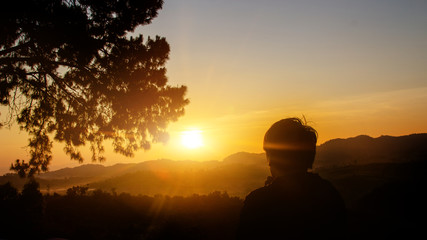 sunrise on horizontal line of mountain for waking