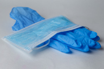 protective mask and rubber gloves. Suitable for demonstrating personal protective equipment during the period of viruses