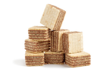 Heap of square wafer biscuits isolated on white