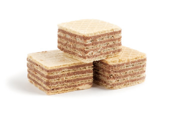 Three wafer biscuits cubes isolated on white