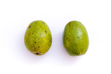 fresh green amberella fruit, isolated on a white background and copyspacefresh green amberella fruit, isolated on a white background and copyspace, scientific name: Spondias dulcis