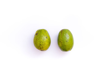 fresh green amberella fruit, isolated on a white background and copyspace, scientific name: Spondias dulcis