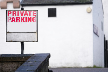 Private parking sign at hotel car park