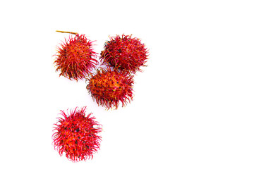 ripe red rambutan fruit, isolated white background and copyspace, scientific name: Nephelium lappaceum