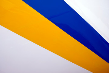 Radial white, yellow and blue bands in perspective.