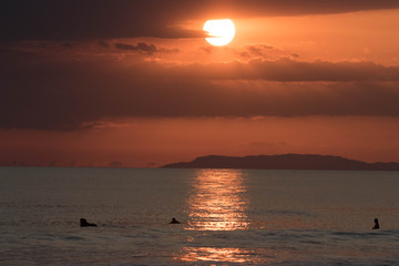 surfing sunset Jaco beach costa rica