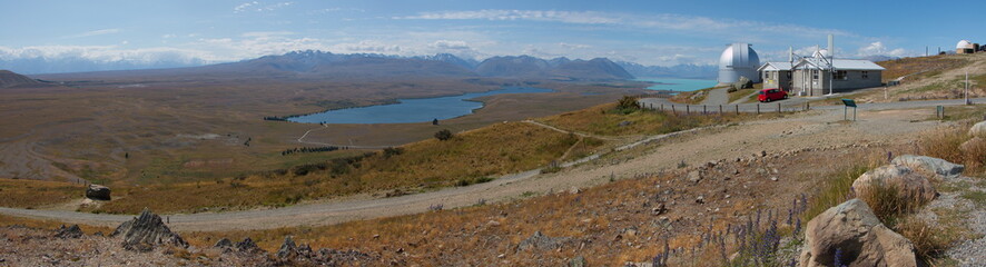 Panoramic view of Lake Alexandrina and Lake Tekapo from Mt John Observatory on South Island of New Zealand
