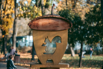 Squirrel feeder in the form of a tree nut in a park