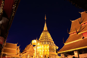 Fototapeta premium Wat Phra That Doi Suthep at night is a Theravada buddhist temple near Chiang Mai, Thailand