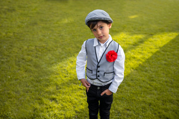 boy with a chulapo cap in san isidro madrid