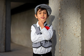 boy with a chulapo cap in san isidro madrid