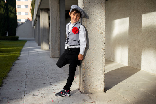 boy with a chulapo cap in san isidro madrid