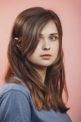 Fototapeta premium portrait of a beautiful young woman with blue eyes on studio background, face of girl with natural beauty, concept people, person with elf ears