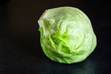 Fototapeta premium iceberg leaves &nbsp;lettuce green freshness. Menu concept food background, keto or paleo diet. top view. copy space for text
