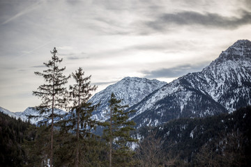 High alpine mountains with snow in Germany and blue beautiful sky