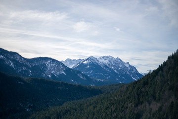 Naklejka na ściany i meble High alpine mountains with snow in Germany and blue beautiful sky