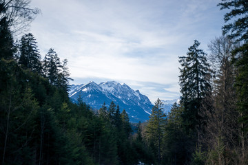 High alpine mountains with snow in Germany and blue beautiful sky