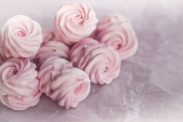 Homemade pink marshmallows on pastel pink background. Creative concept Marshmallow, Meringue. Homemade Sweets dessert