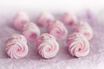 Homemade pink marshmallows on pastel pink background. Creative concept Marshmallow, Meringue. Homemade Sweets dessert