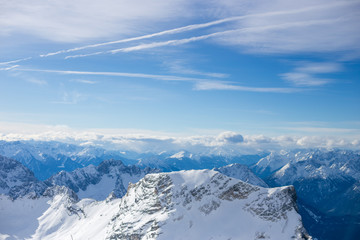 High alpine mountains with snow in Germany and blue beautiful sky