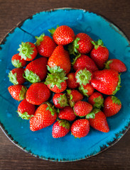 strawberries on a blue plate