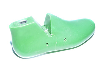 Plastic lasts (pads) used in the manufacture of shoes. Row of plastic shoe lasts used to manufacture modern day shoes. The equipment used for shoe design