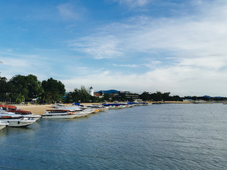 Fototapeta na wymiar Boats and boats are on the beach, the port of Phuket, Thailand