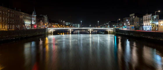Fototapeta na wymiar Beautiful night view scene Cork city center old town Ireland cityscape reflection river Lee