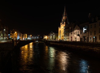 Obraz na płótnie Canvas Beautiful night view scene Cork city center old town Ireland cityscape reflection river Lee